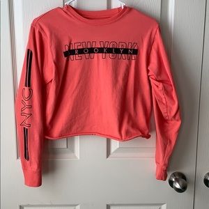 Bright pink long sleeve crop top